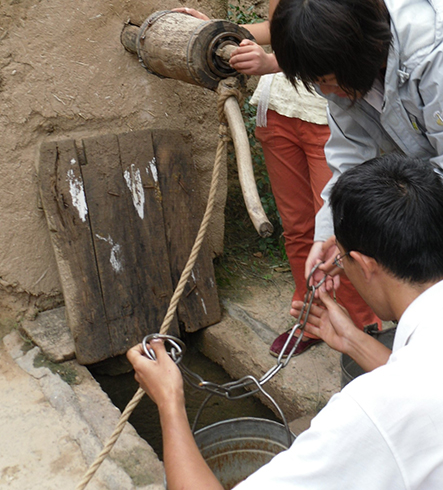 In 2009, together with the team from Peking University,: we conducted social fieldwork in a village of Jingchuan, Gansu province. The rural villagers had no access to tap water, and they had to collect water from the well by buckets for daily usage.